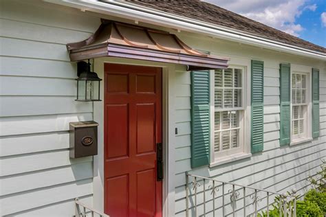 metal front door awning ranch house|ranch style house exterior ideas.